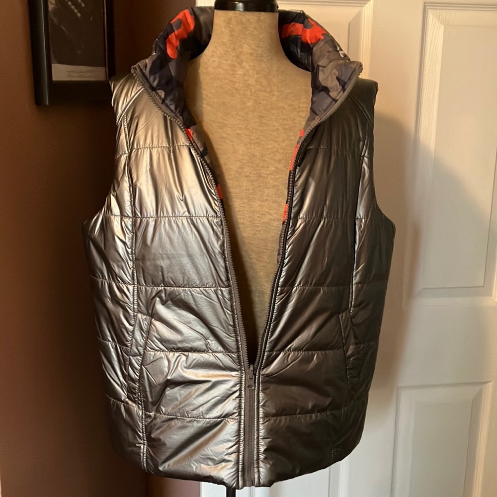 TRIBAL silver puffer vest size Large. Reversible. Trendy and warm. Like new.